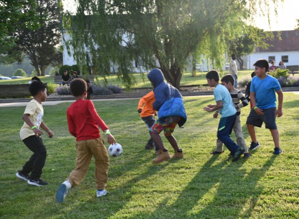  Students play soccer at the ELD Engagement Picnic